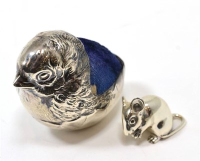 Lot 278 - A Sampson Mordan silver chick pin cushion Chester 1910; and a modern miniature silver model of...