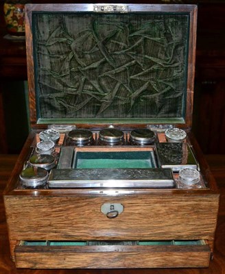 Lot 296 - A Victorian rosewood travelling vanity box, with silver plated fittings