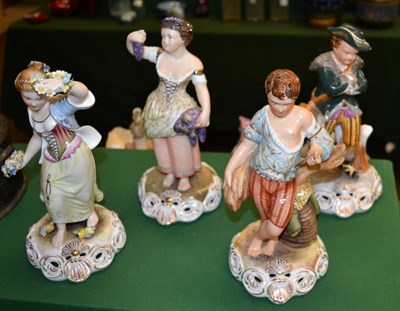 Lot 302 - A composite set of Royal Crown Derby 'Four Seasons' figures, signed by various artists, printed...