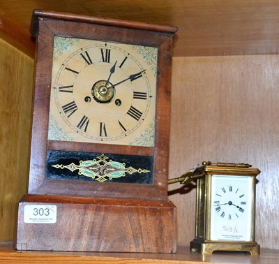 Lot 303 - A French brass carriage timepiece and an American shelf clock