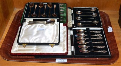 Lot 309 - A cased set of six Elkington & Co silver pistol gripped tea knives, two cased sets of silver...