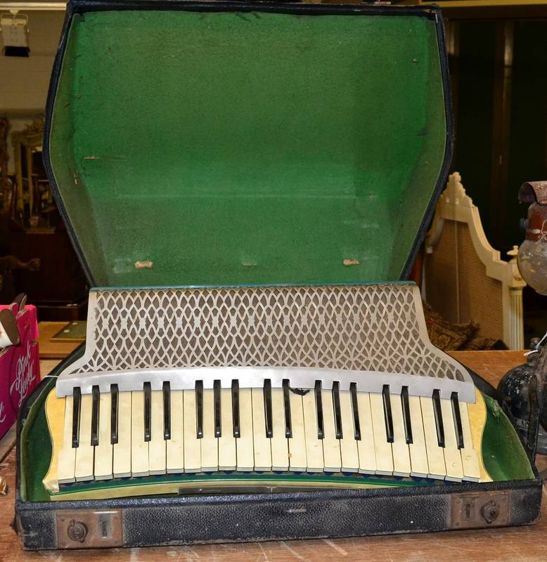 Lot 1008 - Accordion Hohner Organetta III, 120 bass buttons and 41 keys, has slider for two voices (cased)