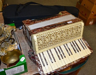 Lot 1012 - Accordion with forty-eight bass buttons and thirty-four piano keys, stamped 'Carsini Made in...