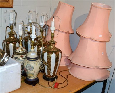 Lot 1036 - A set of four Japanese style table lamps, shades and two others