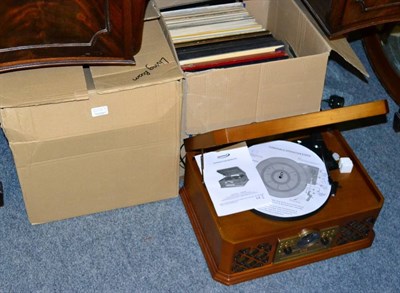 Lot 1059 - A quantity of LP records and a Zenox retro record player