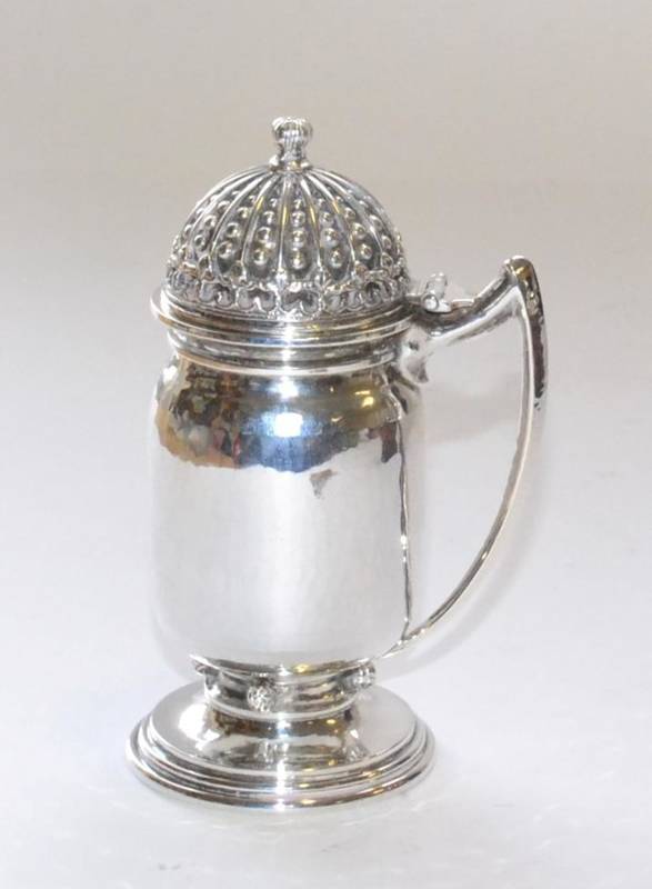 Lot 515 - An Arts & Crafts Mustard Pot, by Omar Ramsden, London, 1938, hammered finish, with...