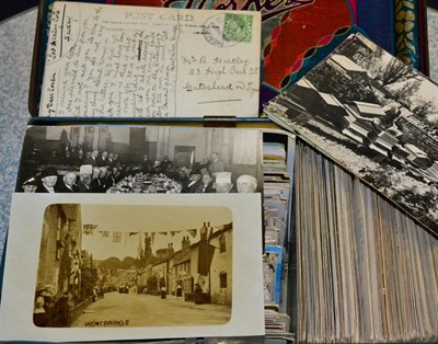 Lot 623 - A Tin housing vintage to modern cards, both unused and used. Includes topographical, greetings,...