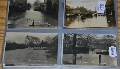 Lot 633 - Pickering. A collection of forty different real photographic cards of floods, 1914, 1922, 1925,...