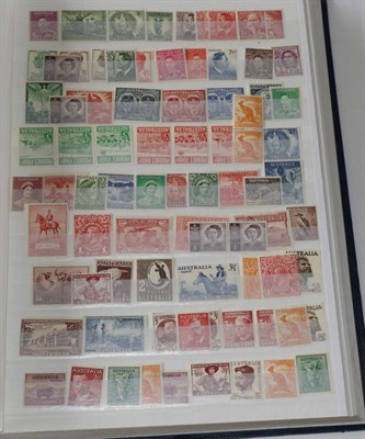 Lot 106 - British Commonwealth. A mint and used part filled large blue stock book. All reigns including...