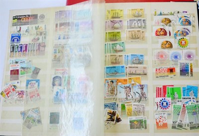 Lot 118 - Malaysian States, Singapore and Borneo. A range of mint and used in four sparsely filled stock...