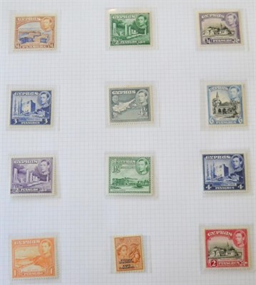 Lot 166 - King George VI mint collection in a blue binder, includes some blocks. Some duplication. Lacks high