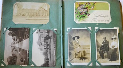 Lot 256 - An Album housing a range of vintage cards portrait, greetings, topographical, social history...