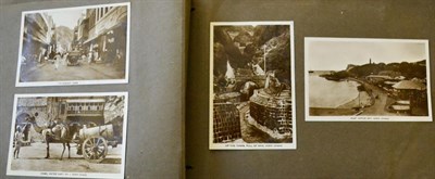 Lot 277 - A 'Steward's' Voyage. A postcard album housing a 1937 photographic journey (includes some real...