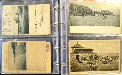 Lot 307 - Redcar. A small maroon album housing a collection of beach scenes, Coatham Hotel, Sam Paul's...