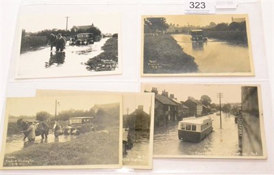 Lot 323 - Sinnington, North Yorkshire, floods of 1927 and 1931. Two cards and a photograph depicting flooding