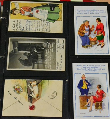 Lot 331 - Comic. Four hundred and twenty five cards in a large album. Includes McGill, Bamforth etc