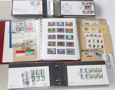 Lot 432 - Guernsey. A 1941 to 1993 mint collection in S.G. printed album. Includes M/Ss, booklets,...