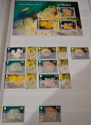 Lot 453 - Jersey. A mint and used collection to 2013 in two large stock books. First Day covers in two albums