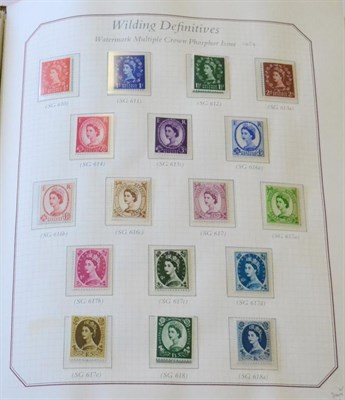 Lot 520 - Great Britain. A Stanley Gibbons Celebration Collection in a boxed Oriel album, numbered 30048. The