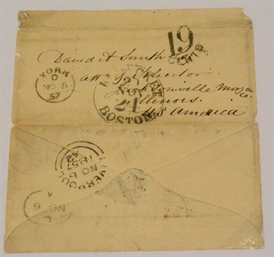 Lot 863 - Great Britain. A November 5,1857 stampless, opened out cover to Jacksonville, USA. The front...