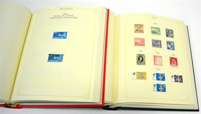 Lot 14 - A Box containing an all world assortment. Includes a Triumph album with China and Korea mint...