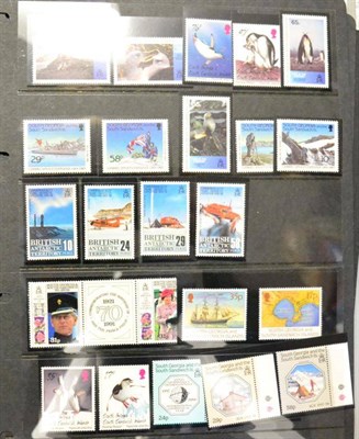 Lot 126 - British Antarctic Territory and Falkland Island Dependencies. A printed album and loose stock cards