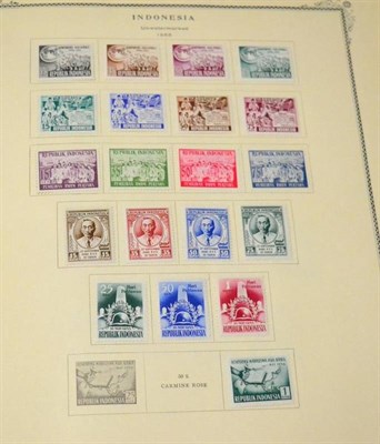 Lot 155 - Foreign Countries I - Z in a Scott album. Includes useful Indonesia 1950's mint; Iraq various...