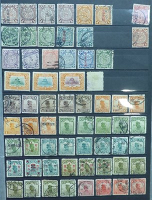 Lot 251 - China.  A Lighthouse stockbook housing a range of issues from Junks to modern times. Mostly...