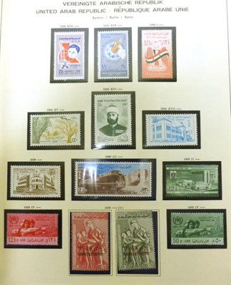 Lot 303 - Egypt. A grey plastic container housing two printed Schaubek albums. One with pages 1958  to...