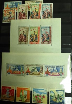 Lot 383 - Laos.  A mainly mint collection in  a part filled claret stockbook. Includes M/S's and some imperfs