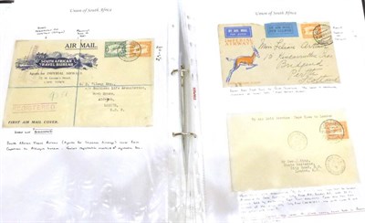 Lot 427 - South Africa. A black binder housing a collection of over seventy First Flight covers 1929 to...