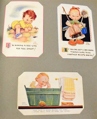 Lot 504 - A Red Postcard Album housing a variety of cards including Mabel Lucie Attwell (16), real...