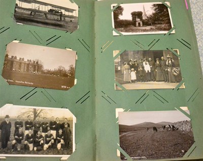 Lot 536 - An Album of Early 20th Century Postcards, housing real photographic, printed photographic,...