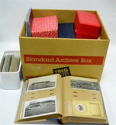 Lot 543 - A Carton housing an assortment of cards, mainly British in albums, containers and loose....