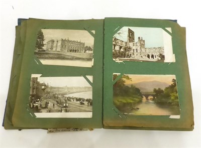 Lot 546 - A Distressed Postcard Album housing a range of vintage topographical, comic, real photographic