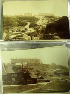 Lot 587 - Saltburn. A red album housing over one hundred and forty cards. Many from the 1930's or...