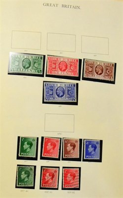 Lot 649 - Great Britain. A red Windsor album housing a mint and used collection to 1970. Sparse to the 1920's