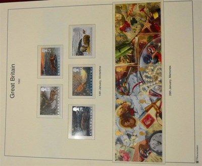 Lot 684 - Great Britain. Two albums housing Presentation packs from the 1990's. An album housing mint...