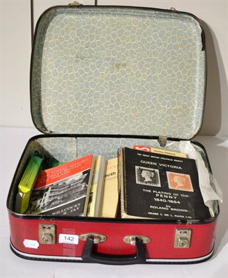 Lot 142 - A Small Suitcase housing various catalogues and reference books. Includes Queen Victoria The...