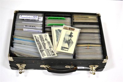 Lot 486 - A Full Suitcase housing vintage through to early QEII cards from Wales, Channel islands, Isles...