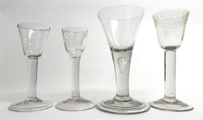 Lot 6 - A Wine Glass, circa 1750, the drawn trumpet bowl on a plain stem with air tear and folded foot,...