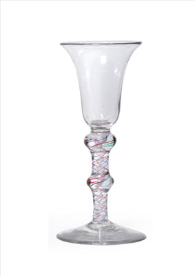Lot 17 - A Tartan Twist Wine Glass, circa 1770, the bell shaped bowl on a double knopped red, blue,...