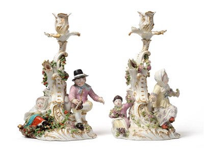 Lot 23 - A Pair of Chelsea Red Anchor Porcelain Figural Candlesticks, circa 1755, as Spring and Winter...