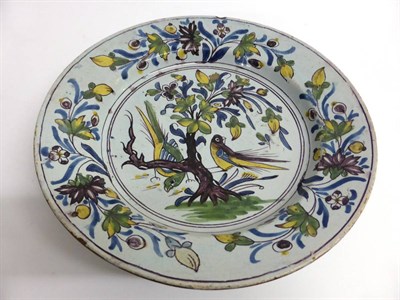 Lot 26 - An English Delft Polychrome Dish, circa 1750, painted in blue, green, yellow and manganese with...