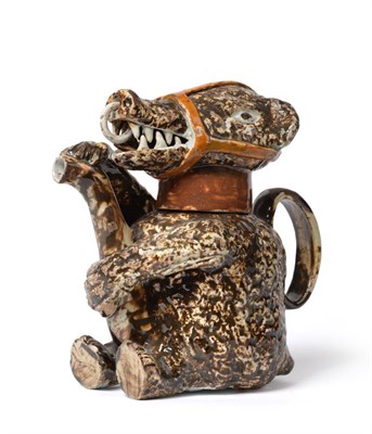 Lot 28 - A Pratt-type Pottery Bear Jug and Cover, circa 1800, naturalistically modelled seated holding a...