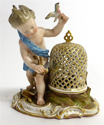 Lot 60 - A Meissen Porcelain Figure of a Cherub, late 19th century, standing holding two birds beside a...