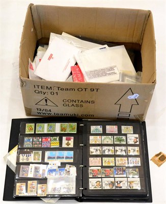 Lot 55 - A Box containing a black binder housing Great Britain mint decimal commemoratives and booklets...