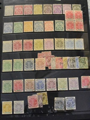 Lot 77 - Orange Free State and odd Victorian Great Britain, mint and used with duplication in a claret...