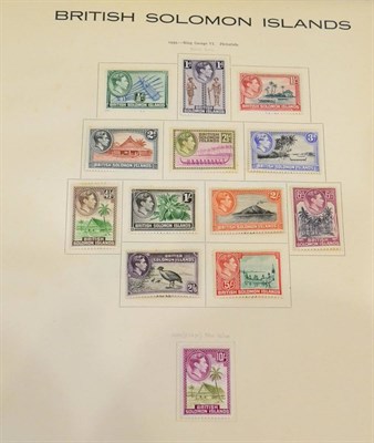 Lot 84 - All Eras World Mint and Used in ten blue spring back albums. Better countries include British...