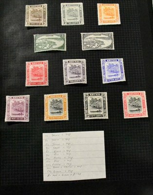 Lot 86 - Middle Period Mint Great Britain and British Commonwealth in a multi ring binder. Includes...